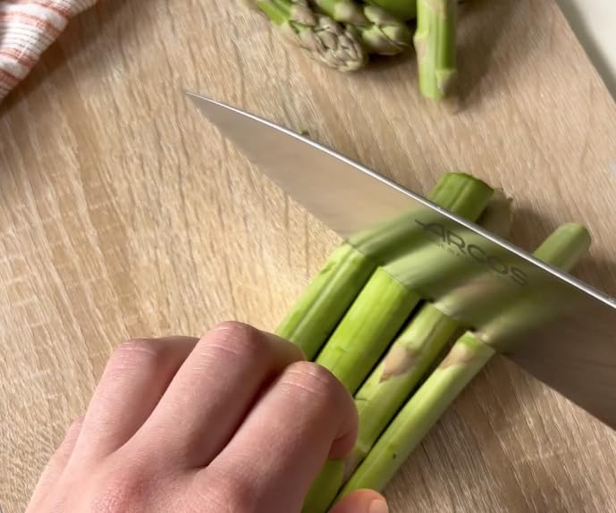 Arcos Chef Knife 8 Inch Stainless Steel. Professional Multipurpose Cooking Knife to Cut and Clean Vegetables. Ergonomic Polyoxymethylene Handle and 210mm Blade. Series Opera. Color Black - Image 9